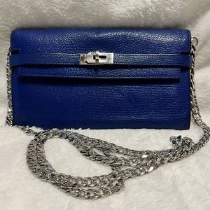*sold* Blue Hermes Kelly Wallet with palladium hardware.